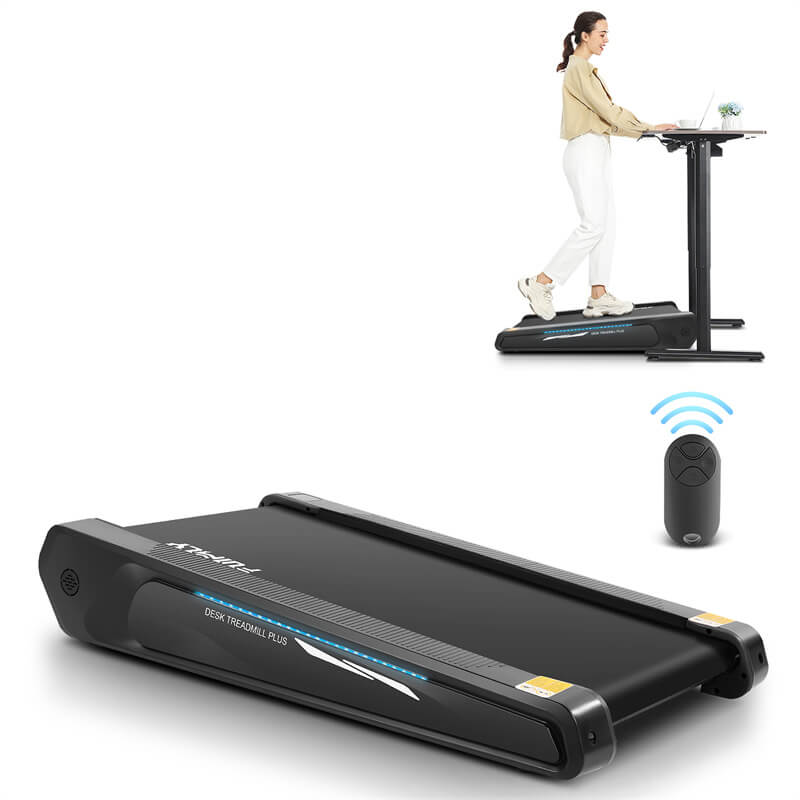 A girl runs on a black smallest under-desk treadmill, working